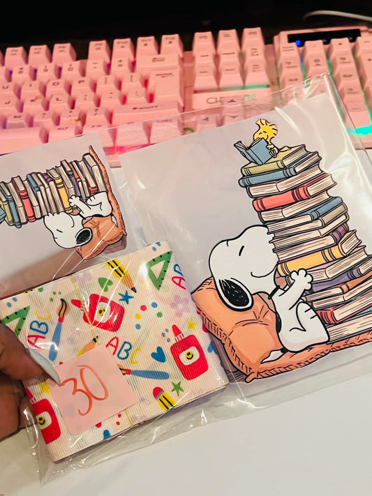 Snoopy reading books